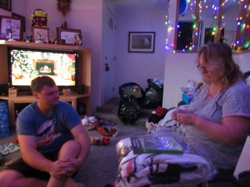 Jonny and mom opening presents